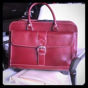 Leather rolling bag